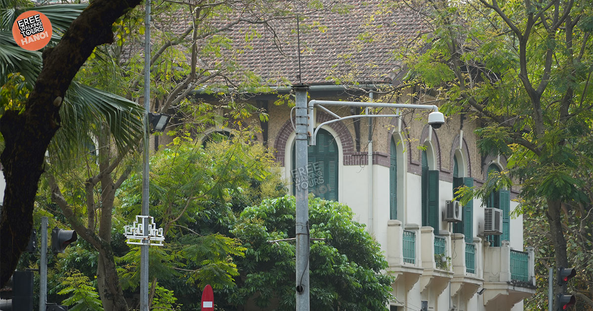 French-style balconies in Hanoi's Old Quarter showing aged facades
